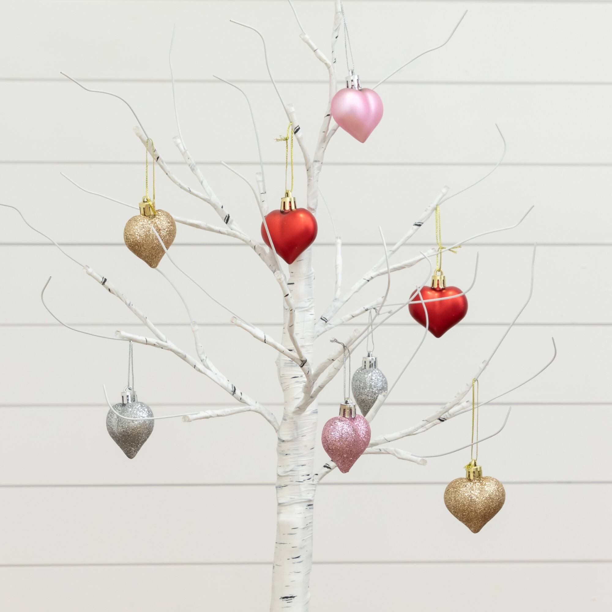2ft. Pre-Lit Artificial Valentine's Day Twig Tree with 24 Warm White LED Lights and Heart Ornaments